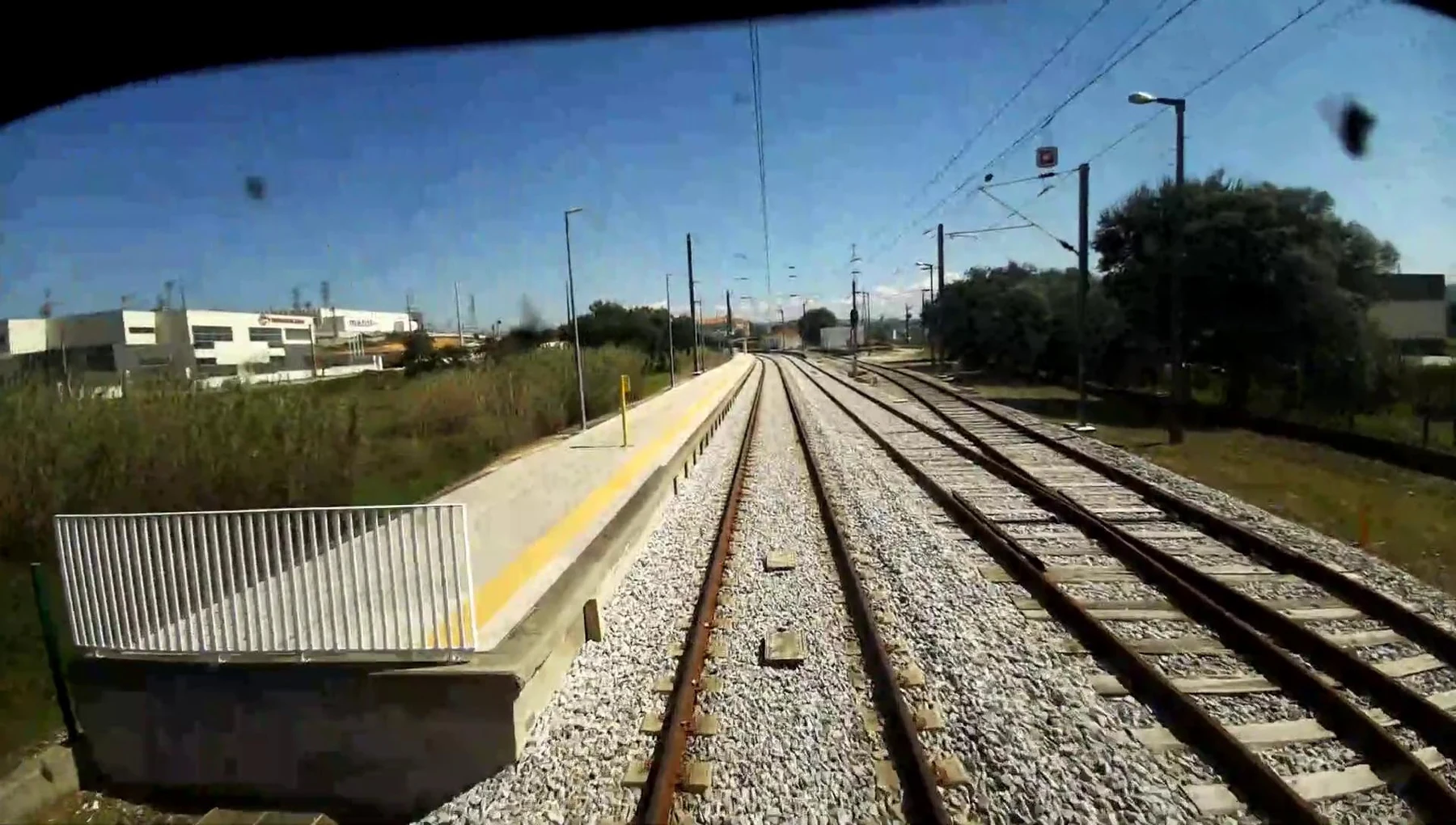 Original forward-facing railway corridor image before semantic segmentation.