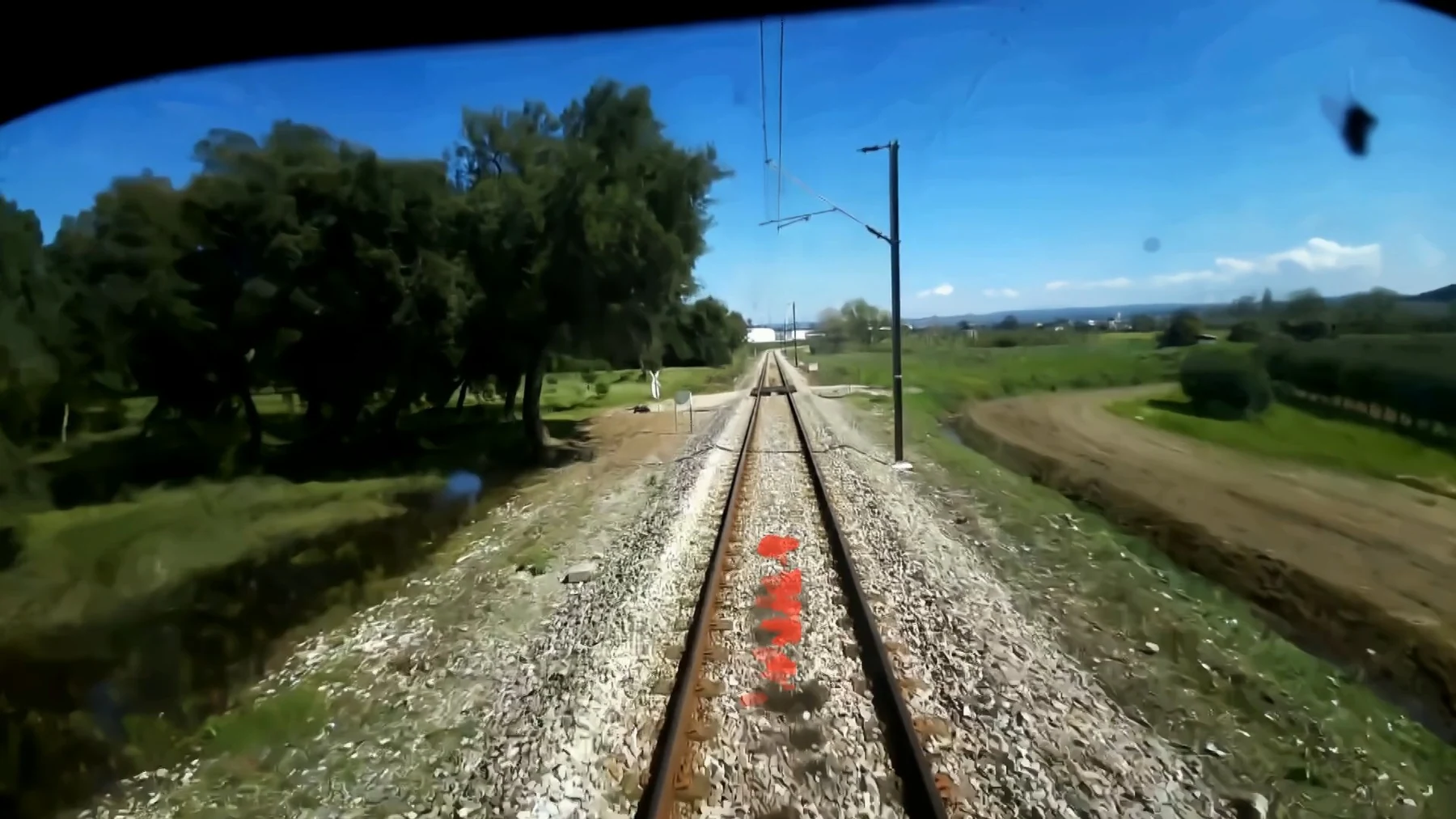 Forward-facing railway corridor image before vegetation detection.